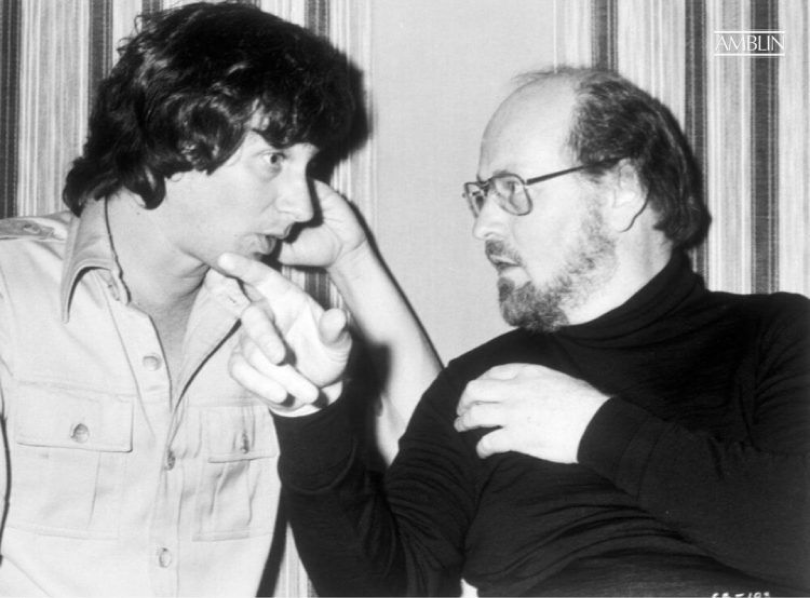 Discussing with composer John Williams the finer points of marrying the grand sights to the magnificent score for Close Encounters of the Third Kind, during recording sessions for the film.