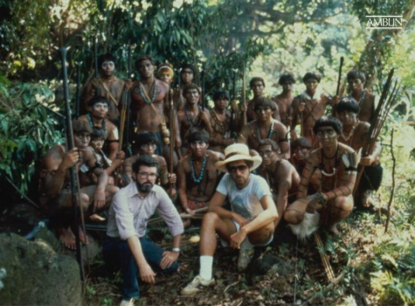 George Lucas (L) and Steven Spielberg (R), in Hawaii with the Hovitos (or at least the fine talents who portrayed them), filming the opening adventure in Raiders. Smile for the camera, fellas!