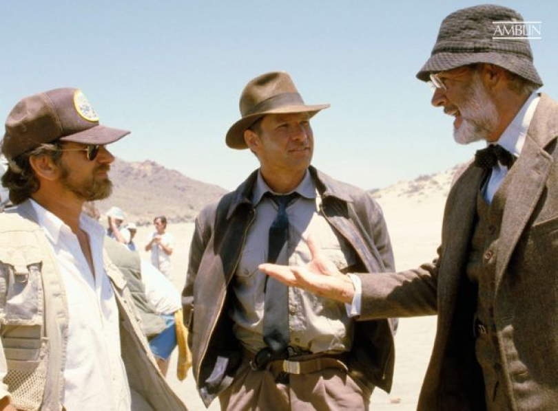 Working out the ins-and-outs of a key action setpiece with his Indiana Jones and the Last Crusade stars Harrison Ford and Sean Connery.
