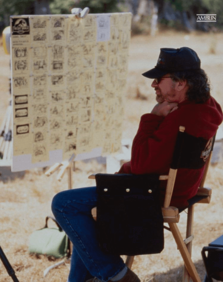 Spielberg sits next to the storyboard for the opening sequence in The Lost World Jurassic Park, his 1997 sequel to the monster hit Jurassic Park.